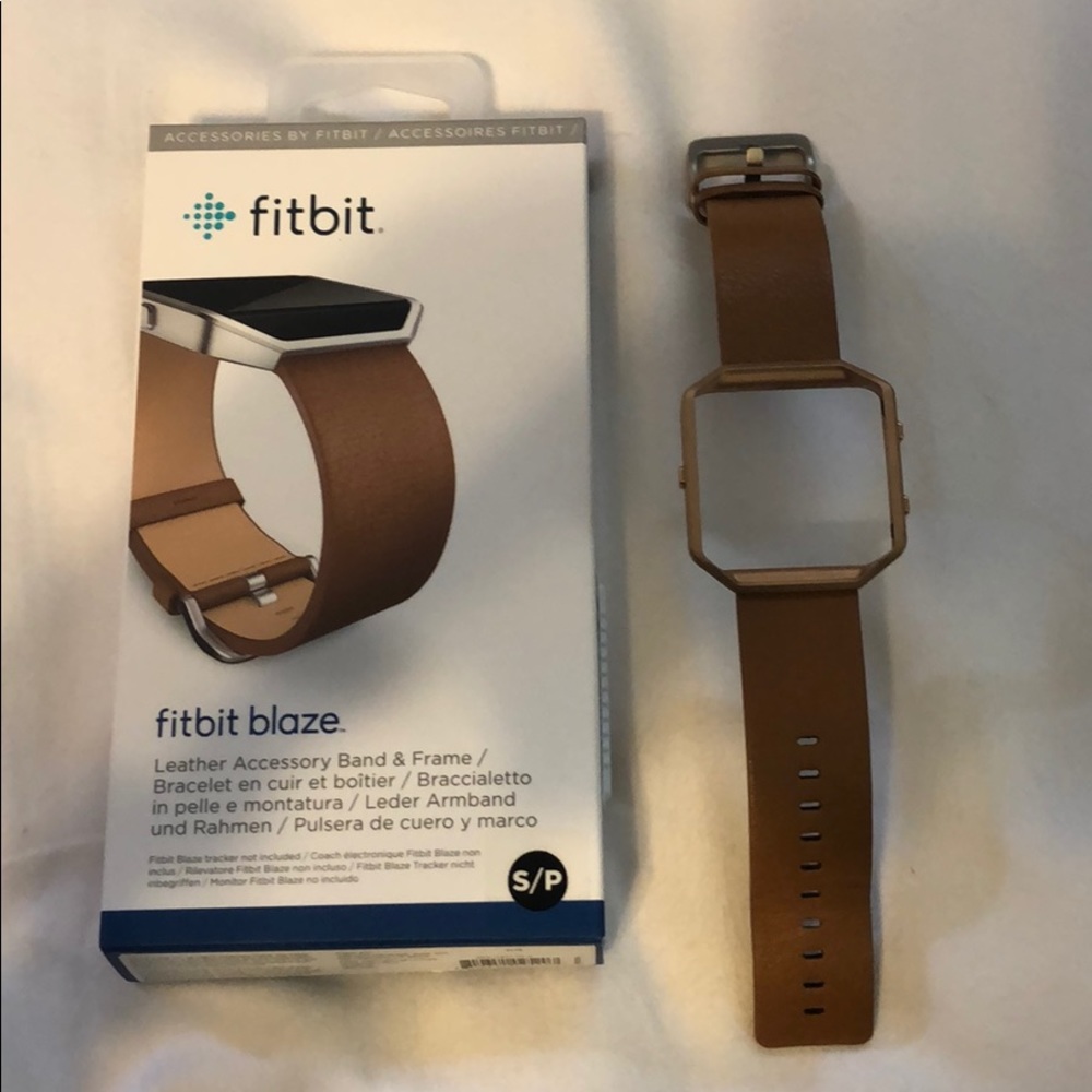 Fitbit Blaze band with gold and silver face.